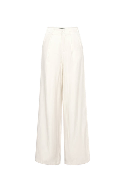 Off-white Céline fluwelen pantalon met extra lange wijde pijpen, onderdeel van een luxe velvet set