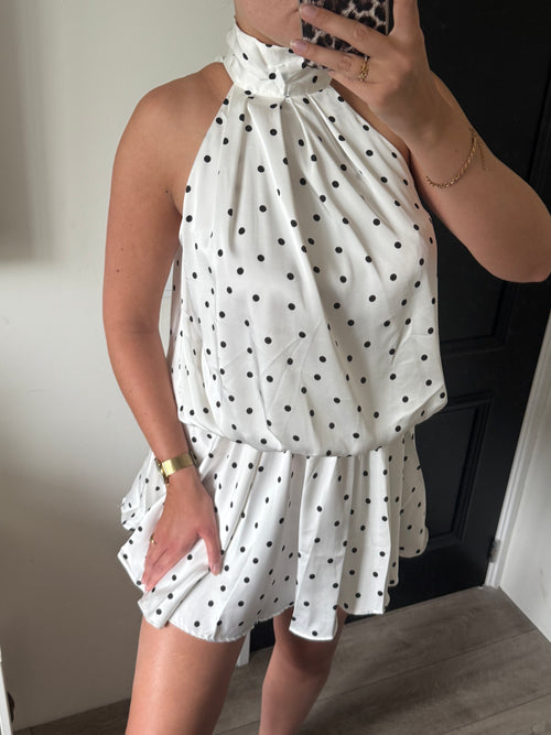 Joëlle Dress witte halterjurk met zwarte polkadot print en zwierige rok